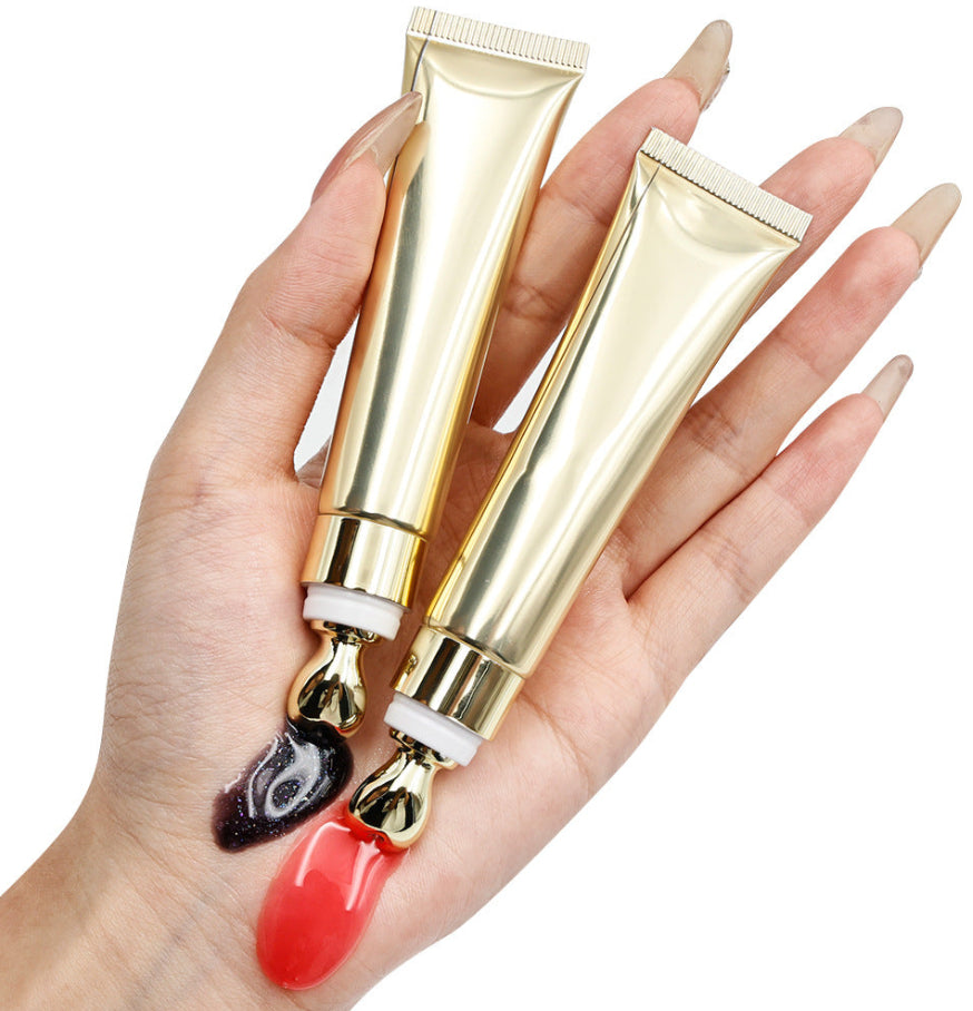 Extrusion tube massage head lip plumping oil