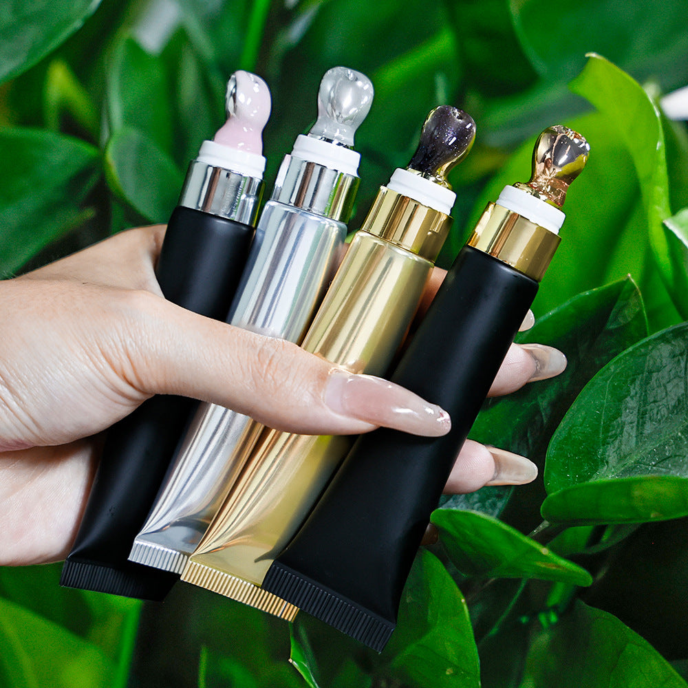 Extrusion tube massage head lip plumping oil